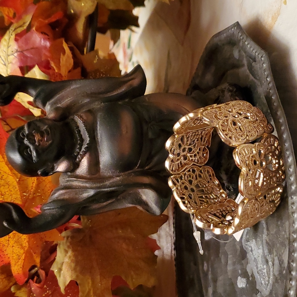 Butterfly/floral gold tone stretch bracelet